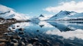 Winter lake landscape with frozen water and snowy mountains Royalty Free Stock Photo