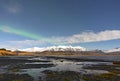 Winter lake near mountain and blue sky background in Hofn, ÃÂ°celand.