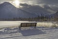 Winter Lakeside Bench in the Rocky Mountain