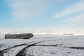 Winter landscape with airplane wreckage and snow capped mountains, Iceland Royalty Free Stock Photo