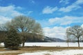 Winter landscape with bright blue sky and clouds Royalty Free Stock Photo