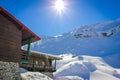 Winter landscape with cabin at Balea Lake and Fagaras Mountains Royalty Free Stock Photo