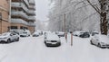 Winter landscape. Cars parking in the snow. Day after freezing .