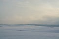 Winter landscape. Cloudy day. Snow desert.