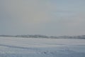 Winter landscape. Cloudy day. Snow desert.