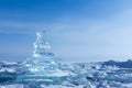 Winter Landscape. Crystal clear ice chunks. Pyramid of clear ice of Lake Baikal Royalty Free Stock Photo