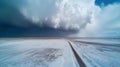 Winter Landscape: Dramatic Clouds Over Snow-Covered Road Royalty Free Stock Photo