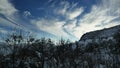 Winter landscape with dramatic clouds Royalty Free Stock Photo