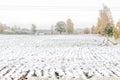 Winter landscape with first snow in the countryside fields with late autumn colors Royalty Free Stock Photo