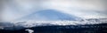 Winter landscape with foggy snowy mountains. Panorama Royalty Free Stock Photo