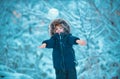 Winter landscape of forest and snow with cute child boy. Enjoying nature wintertime. Happy winter time. Well dressed Royalty Free Stock Photo