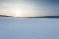 Winter landscape with the forest and the sun Royalty Free Stock Photo