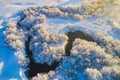 Winter landscape on a frosty day with frost on trees and a river