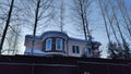 Winter landscape frosty morning in the village, the frost on trees, fences in sunny early morning Royalty Free Stock Photo