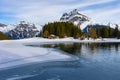 Winter landscape of the frozen Arni Lake with the snow-convered Alps peak Windgaellen Royalty Free Stock Photo