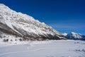 Winter landscape of the frozen Lake Medicine surrounded by the Canadian Rockies in Jasper National Park, Alberta, Canada Royalty Free Stock Photo