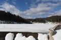 winter landscape frozen lake near the forest