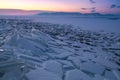 Winter landscape with frozen lake and sunset sky Royalty Free Stock Photo