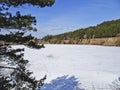 Winter landscape - a frozen and snow-covered quarry Royalty Free Stock Photo