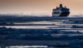 Winter landscape frozen water, tranquil sunset, industrial ship, arctic journey generated by AI Royalty Free Stock Photo