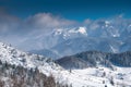 Winter landscape in Fundata village from Rucar Bran pass in Romania at the bottom of Bucegi Mountains Royalty Free Stock Photo