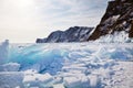 Winter landscape. Huge blocks of transparent ice on the frozen Lake Baikal. Royalty Free Stock Photo