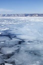 Winter landscape. Lake Baikal near Listvyanka village. Royalty Free Stock Photo