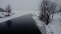 Winter landscape with lake