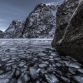 landscape on a lake during Lofoten islands winter. Snow and ice melting Royalty Free Stock Photo