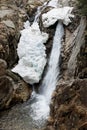 Winter landscape of Lolaia Waterfall in Retezat National Park, Romania Royalty Free Stock Photo