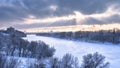 Winter landscape, Moscow, Russia. Scenery of frozen Moskva River covered ice and snow. Panoramic view of city under dramatic sky Royalty Free Stock Photo