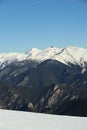 Mountains covered with snow and overgrown with spruce - The Principality of Andorra, Pyrenees, Europe. Royalty Free Stock Photo