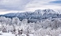 Winter landscape with mountain peaks covered in snow. Beautiful view with Bucegi Mountains part of the Carpathian Mountains, in Royalty Free Stock Photo