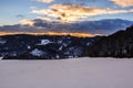 Winter landscape with mountain at sunset. Dramatic sky. orange clouds. Royalty Free Stock Photo