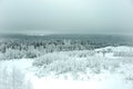 Winter landscape, mountain view of the forest in the snow, spruce and pine, sky and mountains . Ski resort Royalty Free Stock Photo