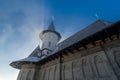 Sunrise on Piatra Fantanele monastery in winter time Royalty Free Stock Photo