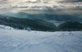 Winter landscape in mountains forest on background of sky Royalty Free Stock Photo