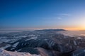 Winter landscape in mountains illuminated at sunrise and in background High Tatras, Slovakia Velky Choc Royalty Free Stock Photo