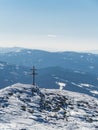 Winter landscape in the mountains in Slovakia with a cross