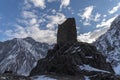 Winter landscape. Old fortress in the snow coverd mountais.