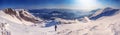 Winter landscape, panorama, banner - top view of a tourist walking up the mountain range Royalty Free Stock Photo