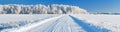 Winter landscape panorama with road and forest Royalty Free Stock Photo