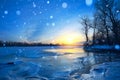 winter landscape panorama; sunset on the bank of a frozen river; ice and snow