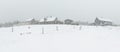 Winter landscape. Panoramic view. Foggy day in a small mountain village. Royalty Free Stock Photo