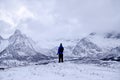 Person Looking onto Snowy Mountains Royalty Free Stock Photo