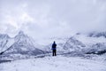 Person Looking onto Snowy Mountains Royalty Free Stock Photo