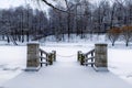 Winter landscape with pier and snowy forest