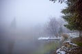 Winter landscape with a pontoon on a lake