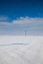 Winter landscape with power line columns Royalty Free Stock Photo
