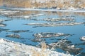 Winter landscape. Reflection of blue sky in a river.